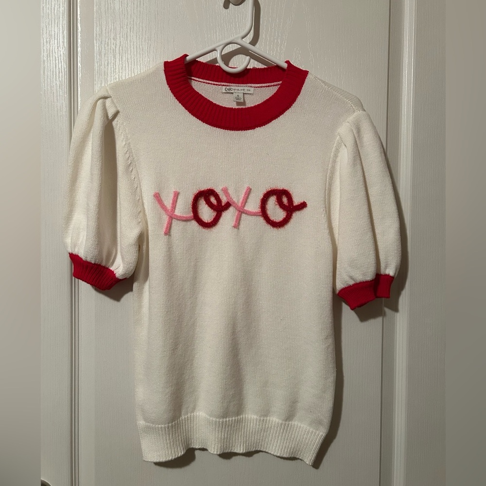 White Sweater with Red and Pink Accents